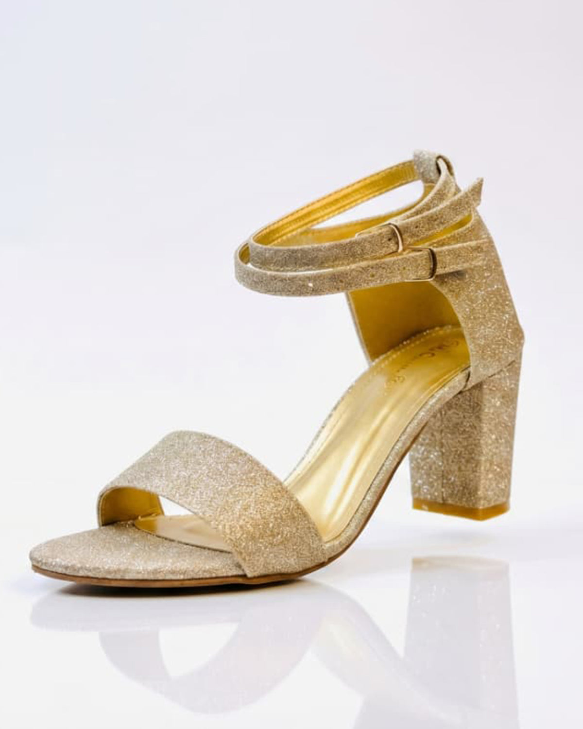 Glitzy golden sandals